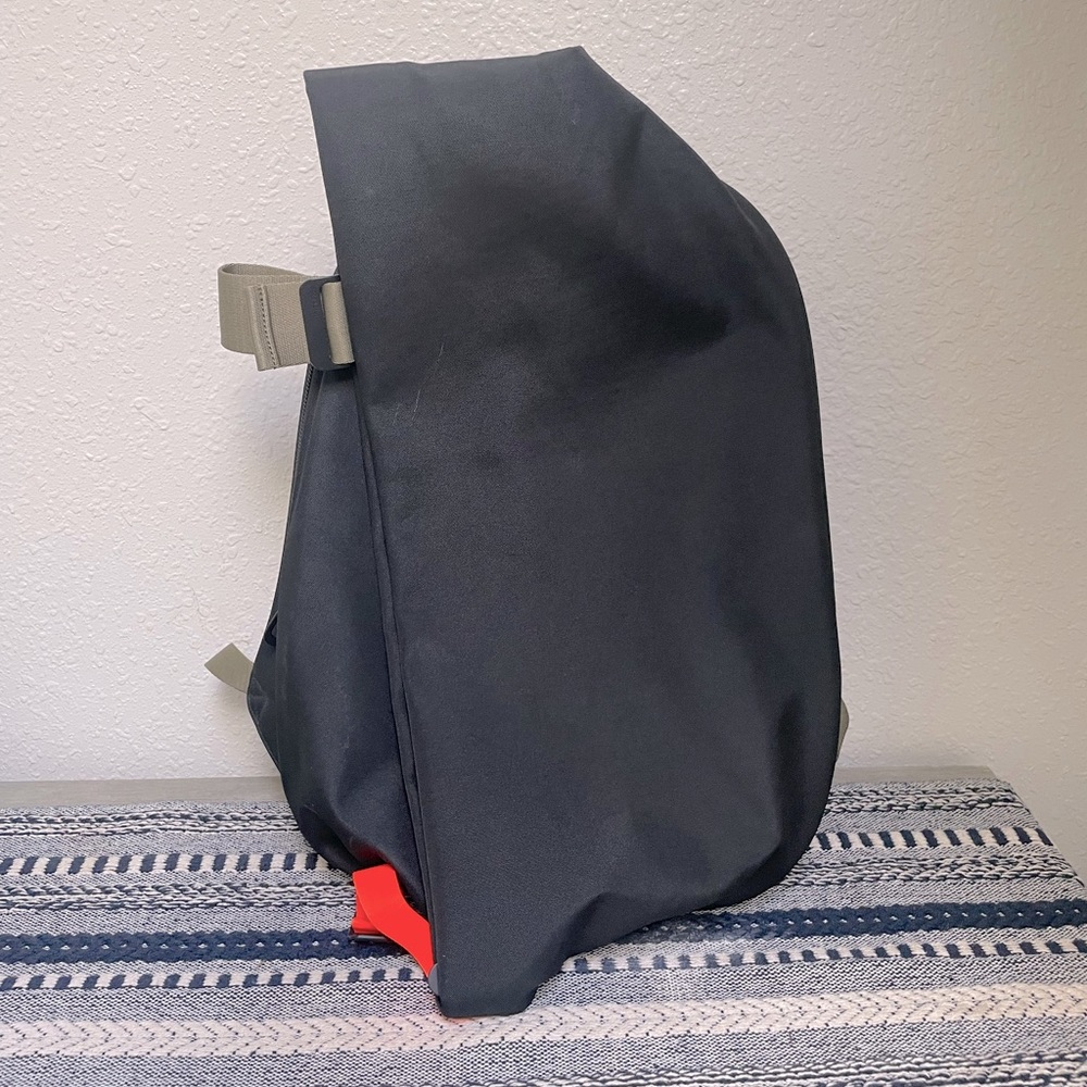Cote & Ciel backpack. Black nylon with orange accent strap. Worn once.